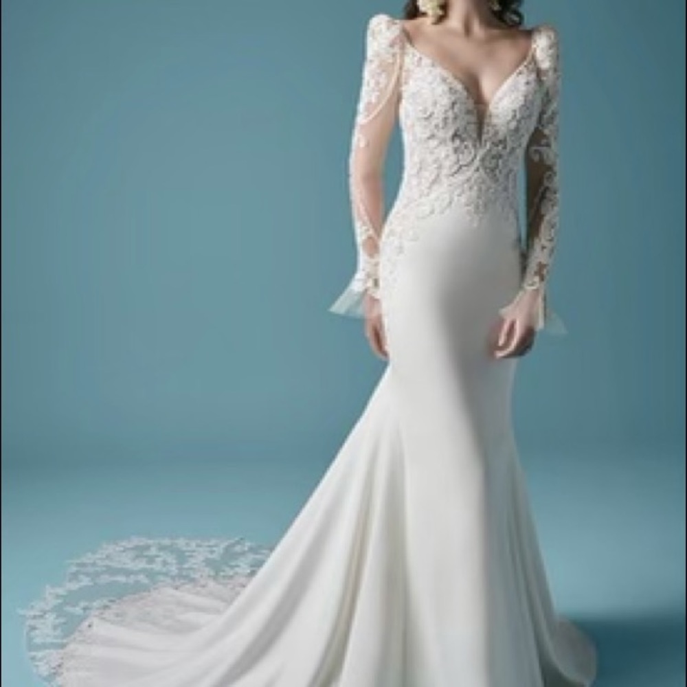 WEDDING GOWN by Maggie Sottero. Purchased from Kleinfeld Bridal in New York